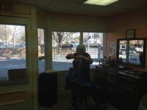 Dunn chats with her customer while cutting her hair. Photo by Cameron Saucier